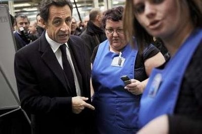 France's President Nicolas Sarkozy (L) speaks with employees in the French tyre and valve manufacturer Schrader in Pontarlier, eastern France, on March 9, 2010 during a visit dedicated to employment and professional training. France's President Nicolas Sarkozy (L) speaks with employees in the French tyre and valve manufacturer Schrader in Pontarlier, eastern France, on March 9, 2010 during a visit dedicated to employment and professional training.